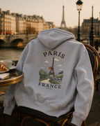 paris heavyweight hoodie in front of eiffel tower