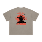 Beige t-shirt with a samurai design and text on the back against a white background
