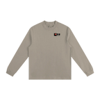 Beige long-sleeve shirt with a logo on the chest against a white background