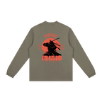 Brown long-sleeve shirt with red and black graphic design on a white background