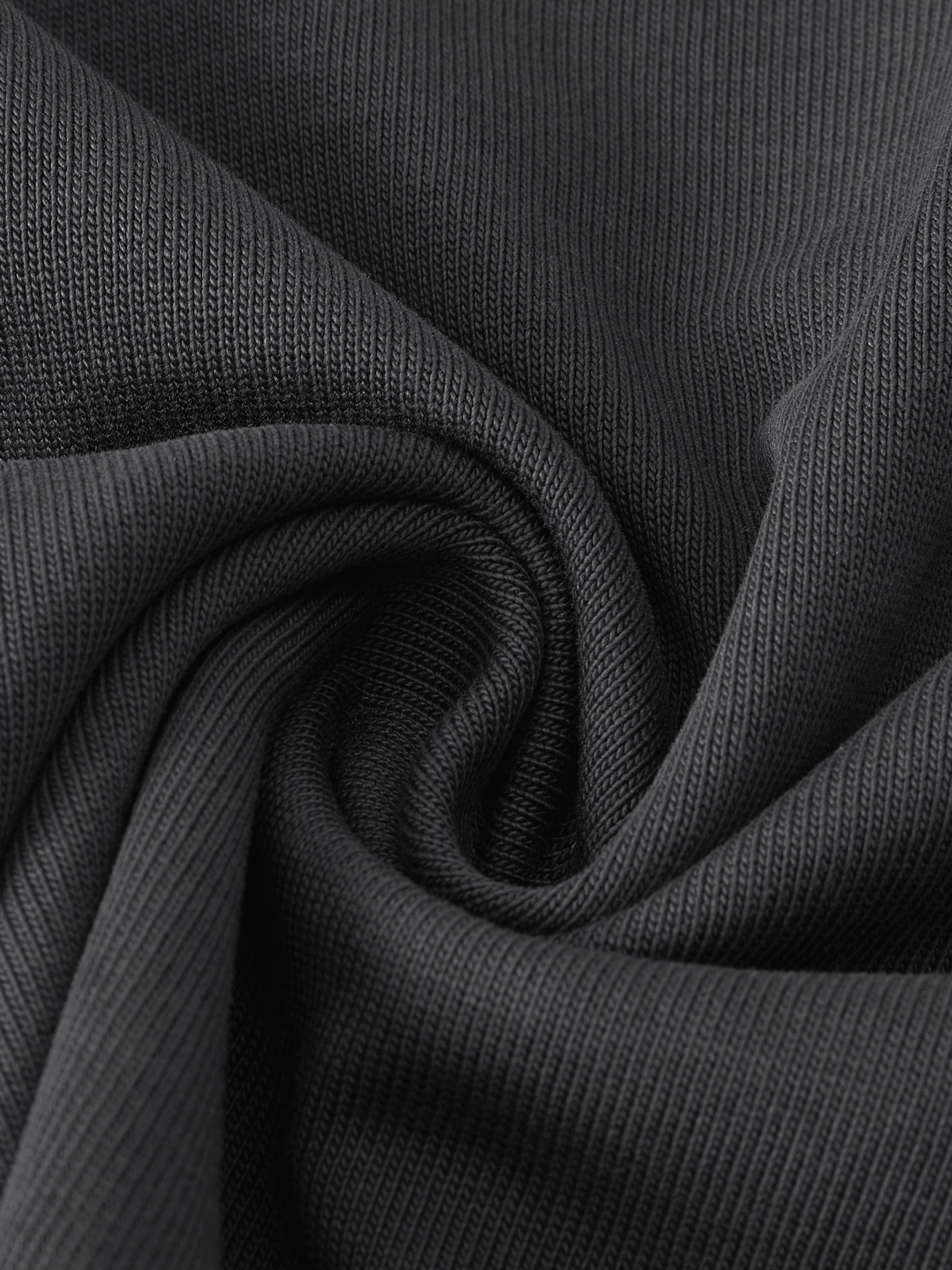 Oktoberfest oversized t-shirt black minimalist streetwear tee close up fabric